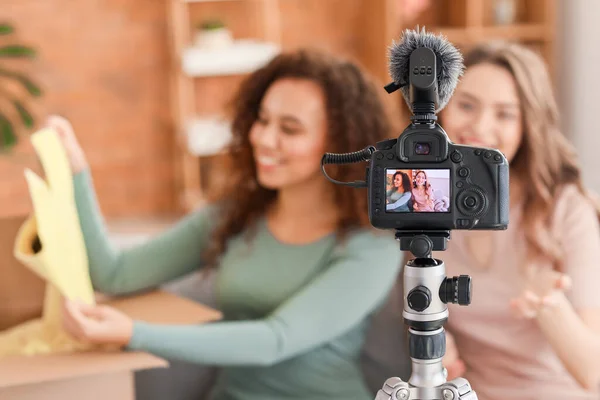 Young Female Bloggers Recording Video While Unpacking Parcel Home — Stock Photo, Image