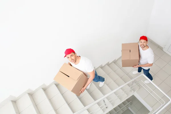 Loaders Carrying Boxes Stairway — Stock Photo, Image