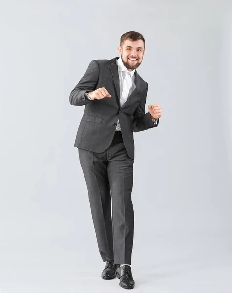 Handsome Young Businessman Dancing Light Background — Stock Photo, Image