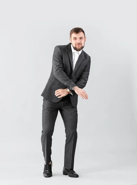 Guapo Joven Empresario Bailando Sobre Fondo Claro — Foto de Stock