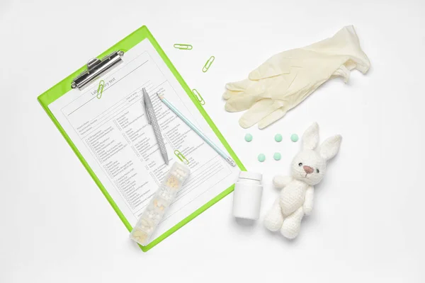 Laboratory Test Form Gloves Pills Toy White Background — Stock Photo, Image