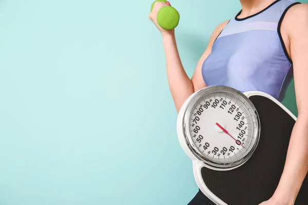 Young Woman Weight Scales Dumbbell Color Background — Stock Photo, Image