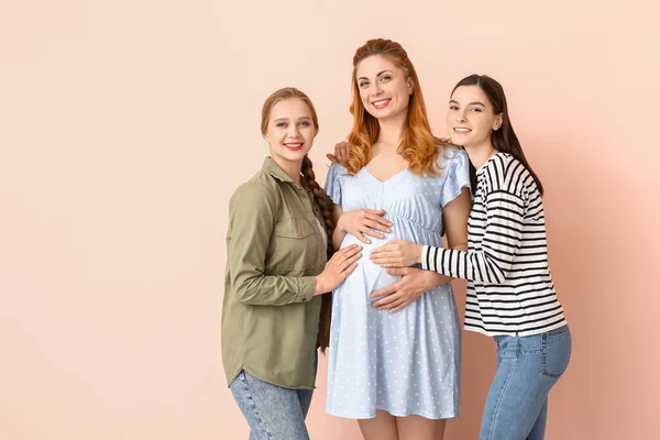 Lesbian Couple Pregnant Woman Color Background Surrogate Motherhood Concept — Stock Photo, Image