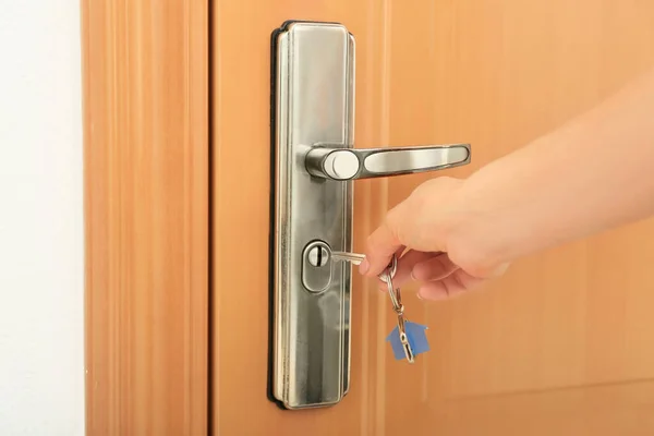 Woman Opening Door Key Closeup — Stock Photo, Image