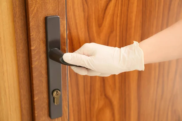 Woman Protective Gloves Opening Door Closeup — Stock Photo, Image