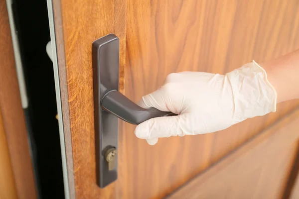 Woman Protective Gloves Opening Door Closeup — Stock Photo, Image