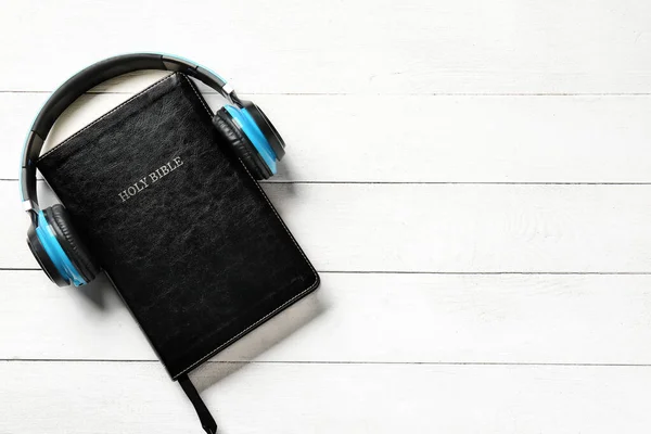 Holy Bible Headphones White Wooden Background — Stock Photo, Image