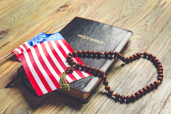 Holy Bible Usa Flag Rosary Beads Wooden Background — Stock Photo, Image