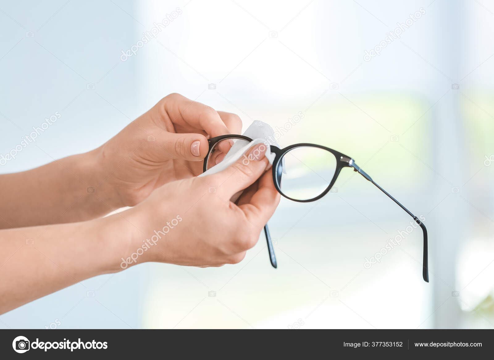 Woman Disinfecting Eyeglasses Home — Stock Photo © serezniy 377353152