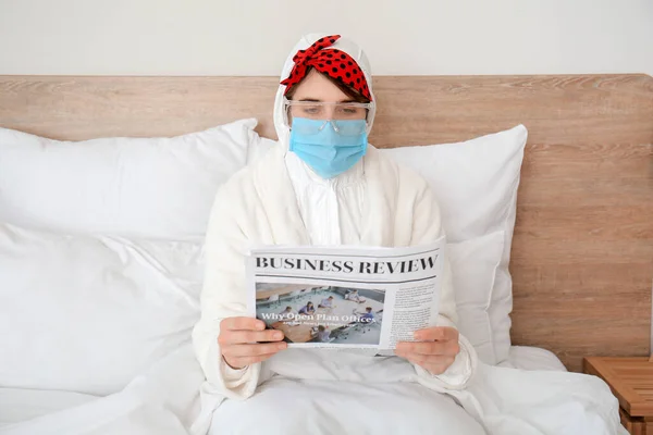 Housewife Protective Costume Reading Newspaper Bedroom — Stock Photo, Image
