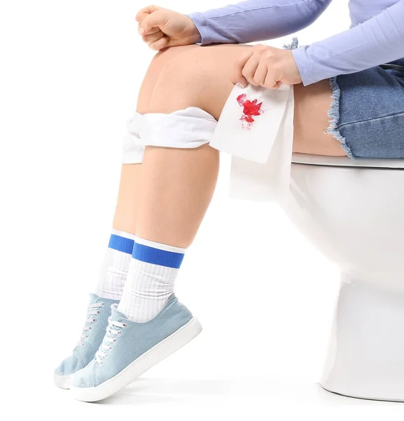 Young Woman Paper Blood Sitting Toilet Bowl White Background Hemorrhoids — Stock Photo, Image