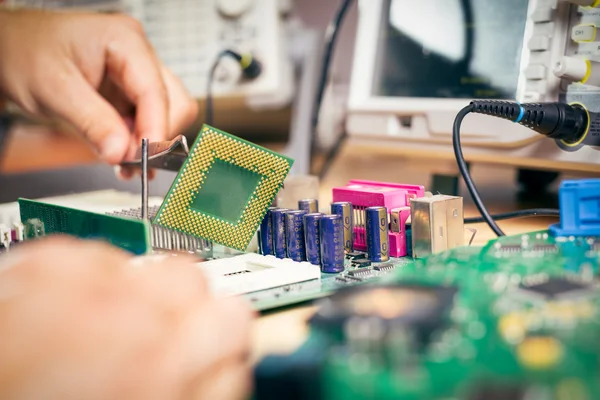 Remove CPU from main circuit board to check problem and repair — Stock Photo, Image