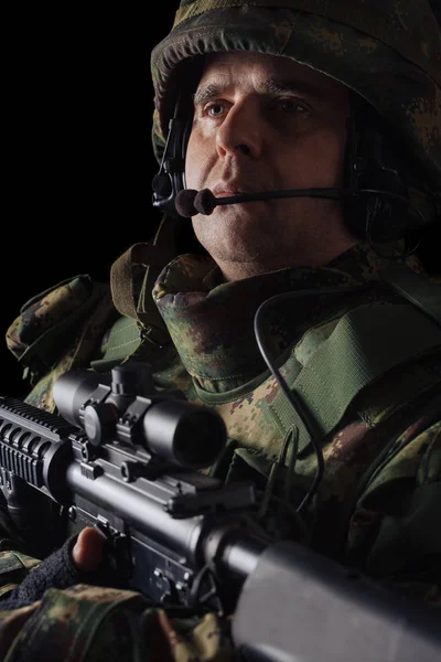 Special forces soldier with rifle on dark background — Stock Photo, Image