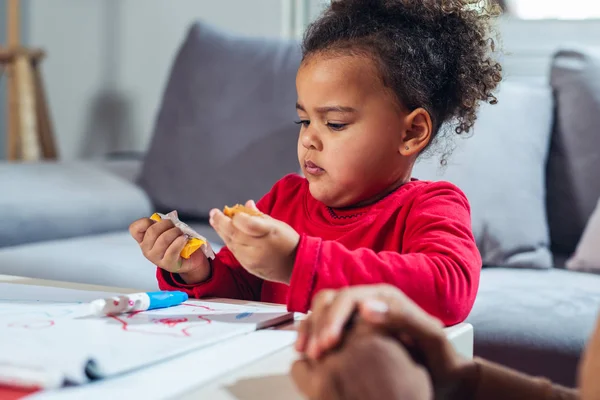 Little Girl Eating Candies Home — 스톡 사진