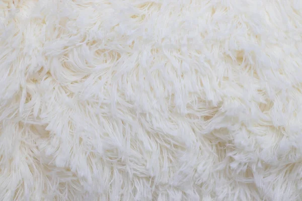 White faux fur texture. Delicate fur milk color.