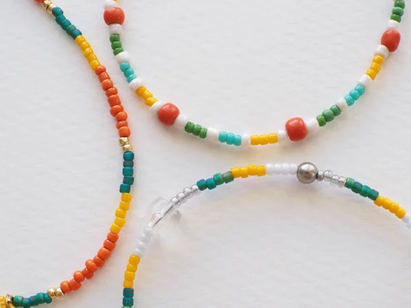 Bracelet Necklace Mixed Beads Various Materials Isolated White Paper — 스톡 사진