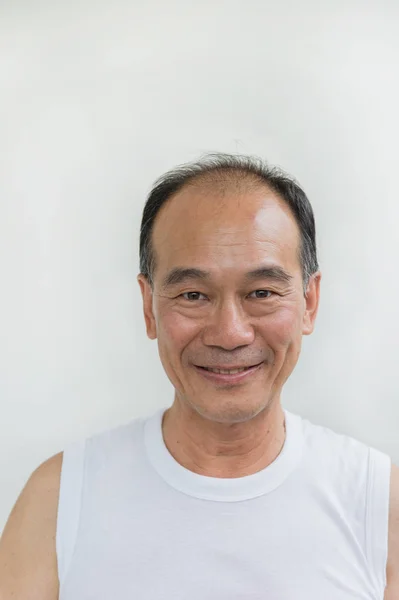 portrait of smile Asian old man wear white shirt on white background