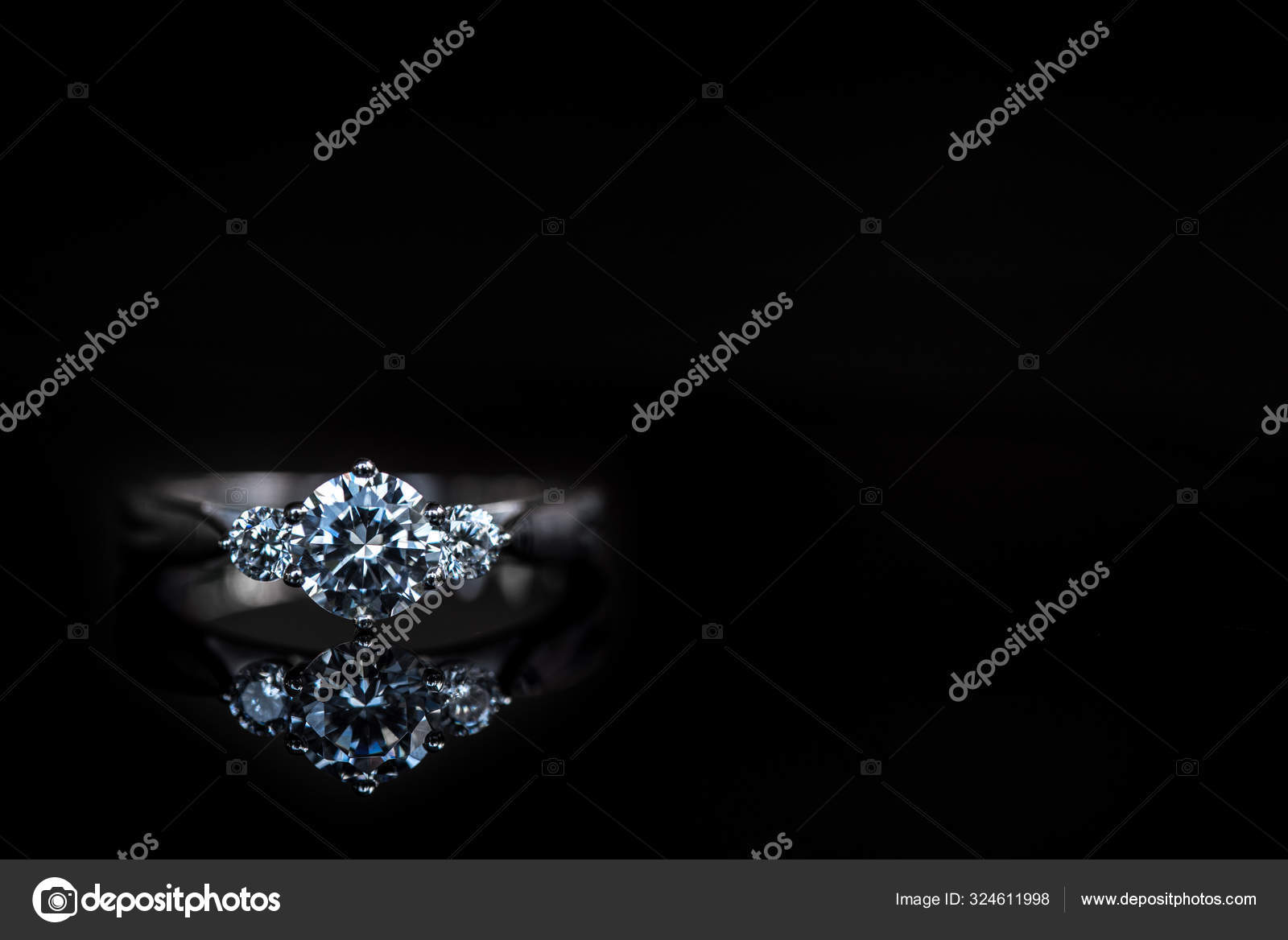 Diamond Ring Black Background Stock Photo by ©avagyanlevon 324611998