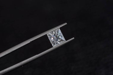 Princess Cut Diamond in Jewelry Tweezers clipart