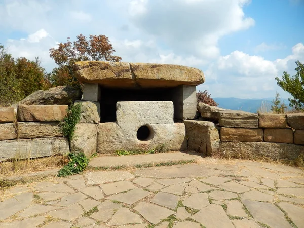 The ancient megalith - a dolmen the "Lunar", "female" dolmen or a dolmen Inf, is located on the mountain Neksis (Russia, near the city of Gelendzhik). Stock Image