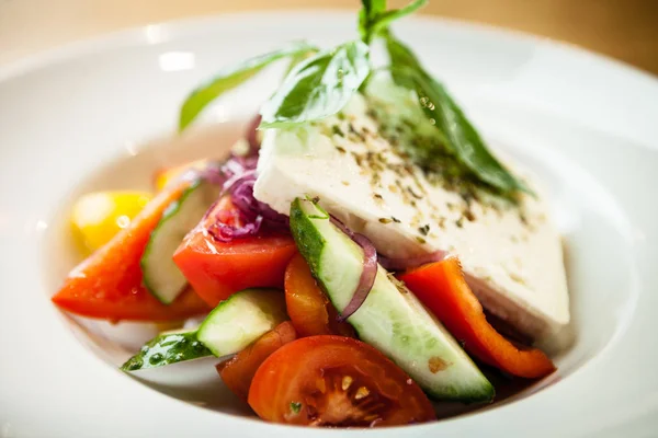 Greek salad on a plate — Stock Photo, Image