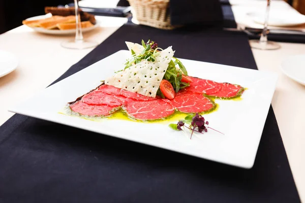 Beef carpaccio with salad — Stock Photo, Image