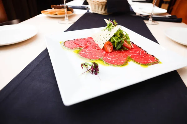 Beef carpaccio with salad — Stock Photo, Image