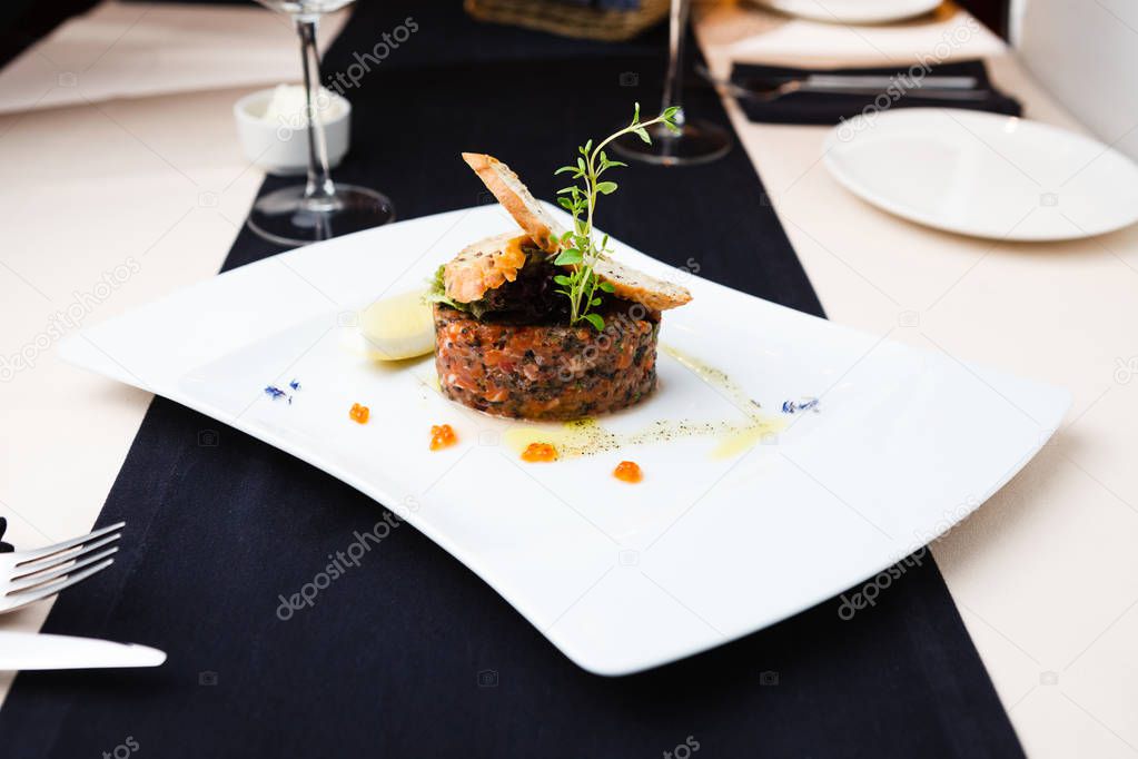 Salmon tartar with red caviar