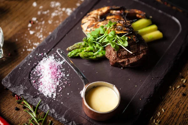 Tasting menu. Beef steak and grilled tiger prawns. — 스톡 사진