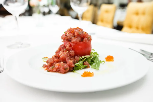 Tuna tartar with tomato served on a plate — Zdjęcie stockowe