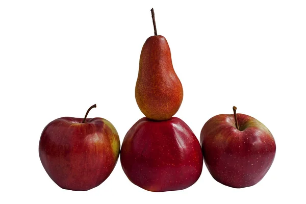 Mellow pear on top of the apple and two apples on the sides — Stock Photo, Image