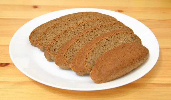 Sliced bread on plate. — Stock Photo, Image