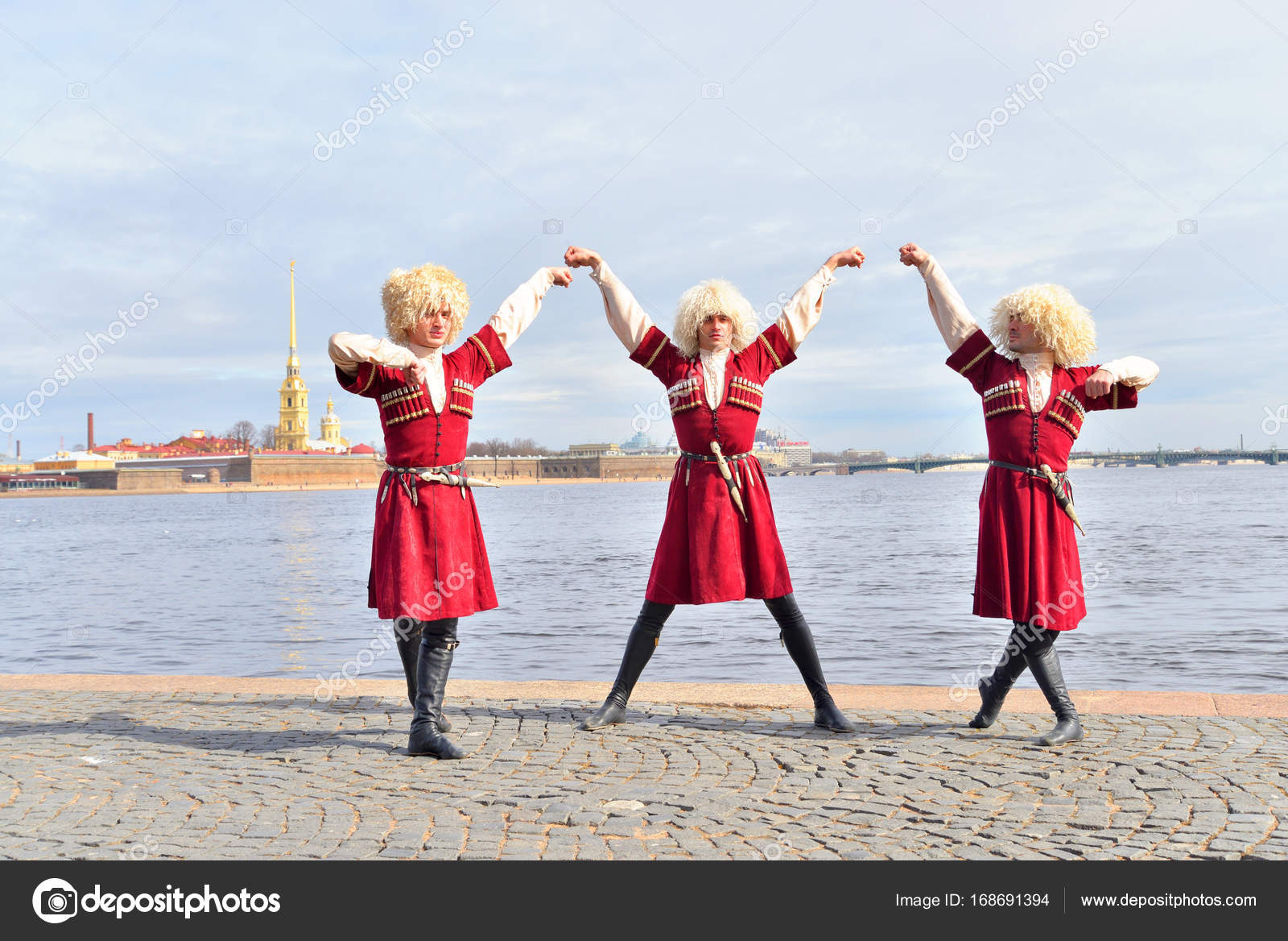 Group Of People In National Caucasian Costumes Is Dancing Lezginka.