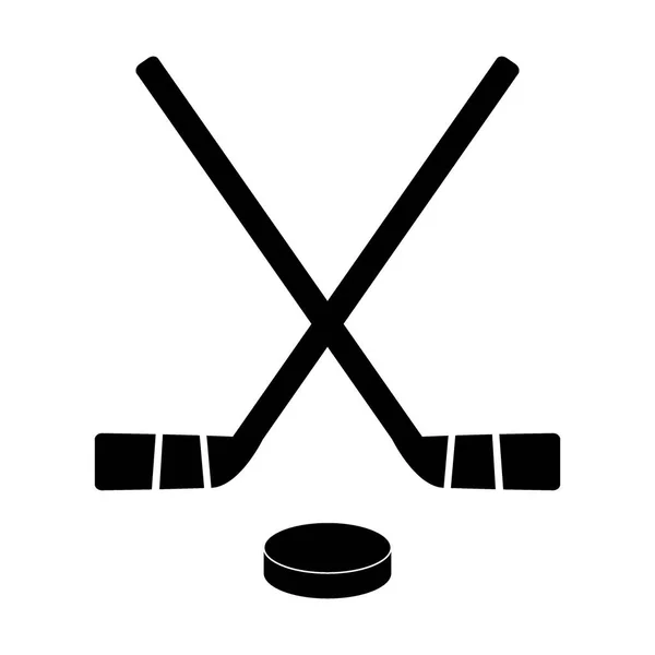 İki çapraz hokey sopaları ve Pak.