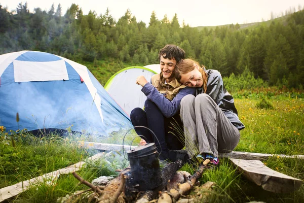 Happy couple in camping — Stock Photo, Image