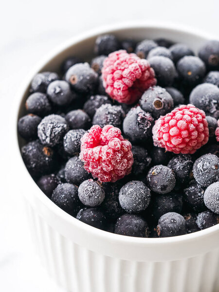 Mix of ripe berries in bowl 