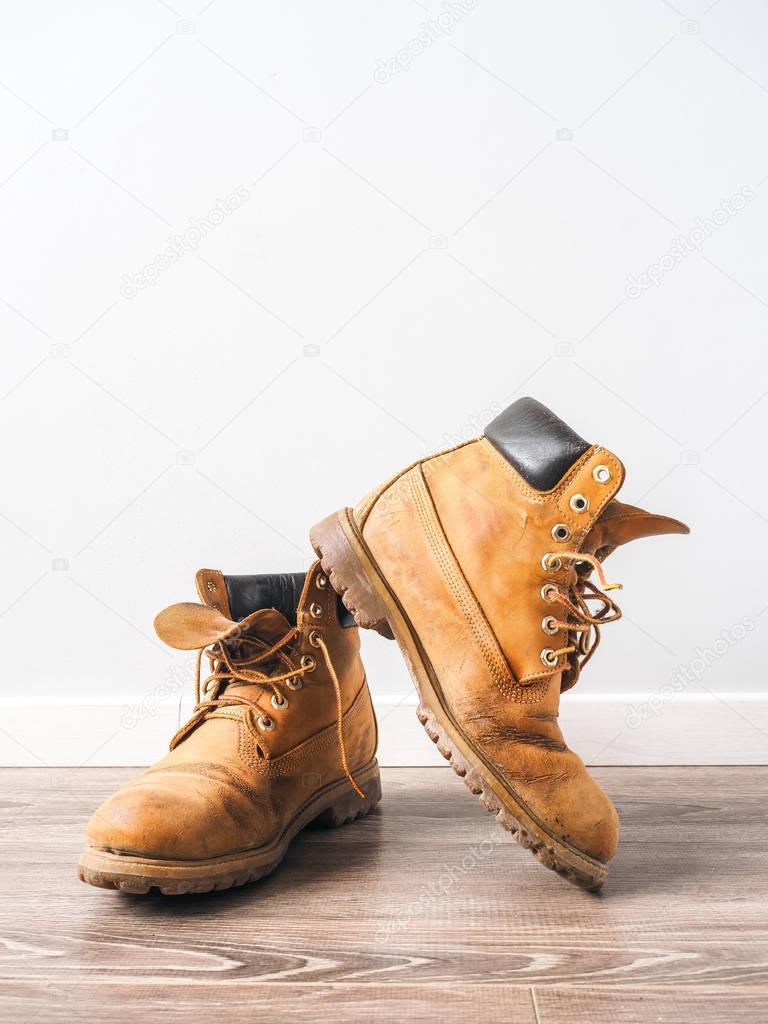 Pair of old yellow working boots