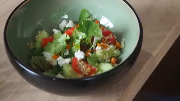 Greek salad in bowls — Stock Video