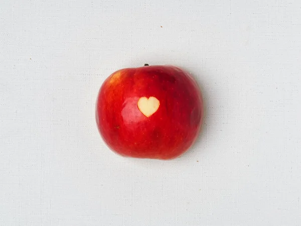 Heart carved on apple