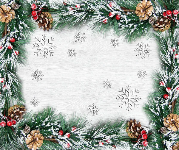 Christmas and New Years composition. The pine cones, spruce branches on a wooden white background — Stock Photo, Image