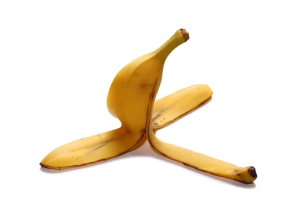 Bananenschil op witte achtergrond — Stockfoto