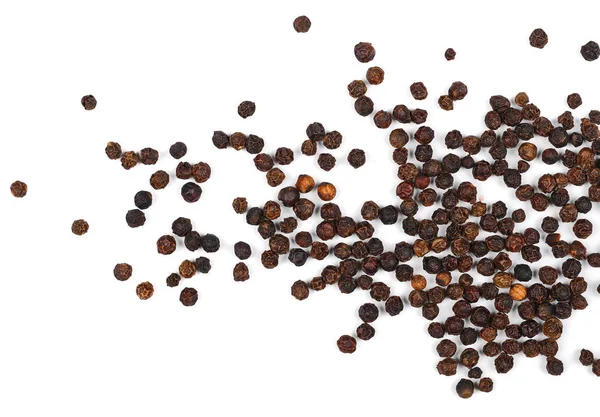 Pile de grains de poivre isolés sur blanc — Photo