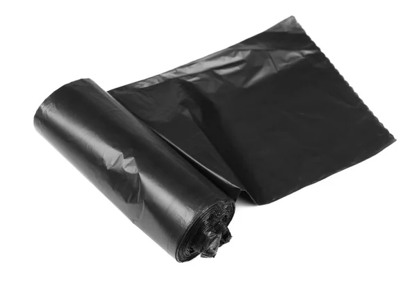 Nuovo rotolo di sacchetti di plastica immondizia isolato su bianco — Foto Stock
