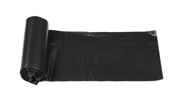 New roll of plastic garbage bags isolated on white — Stock Photo, Image
