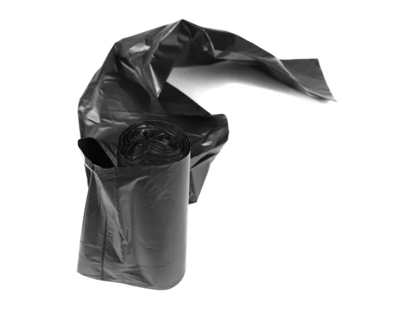 Rolo de sacos de lixo de plástico isolado em branco — Fotografia de Stock