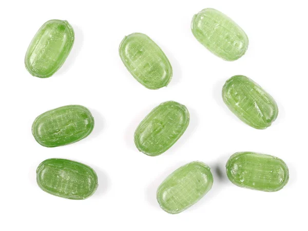 Groene snoepjes geïsoleerd op witte achtergrond — Stockfoto
