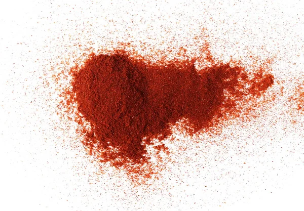 Montón de pimentón rojo en polvo aislado sobre blanco —  Fotos de Stock