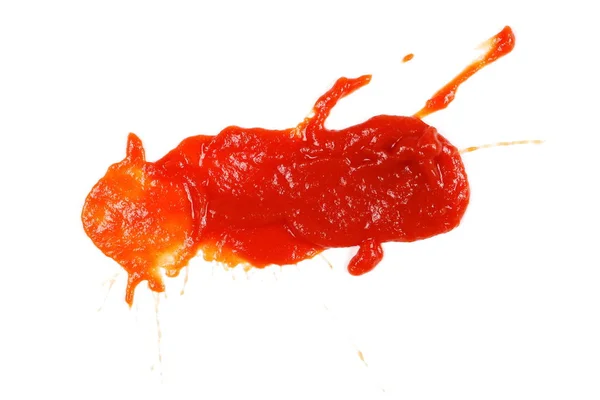 Salpicaduras de ketchup rojo aisladas sobre fondo blanco, textura de puré de tomate — Foto de Stock