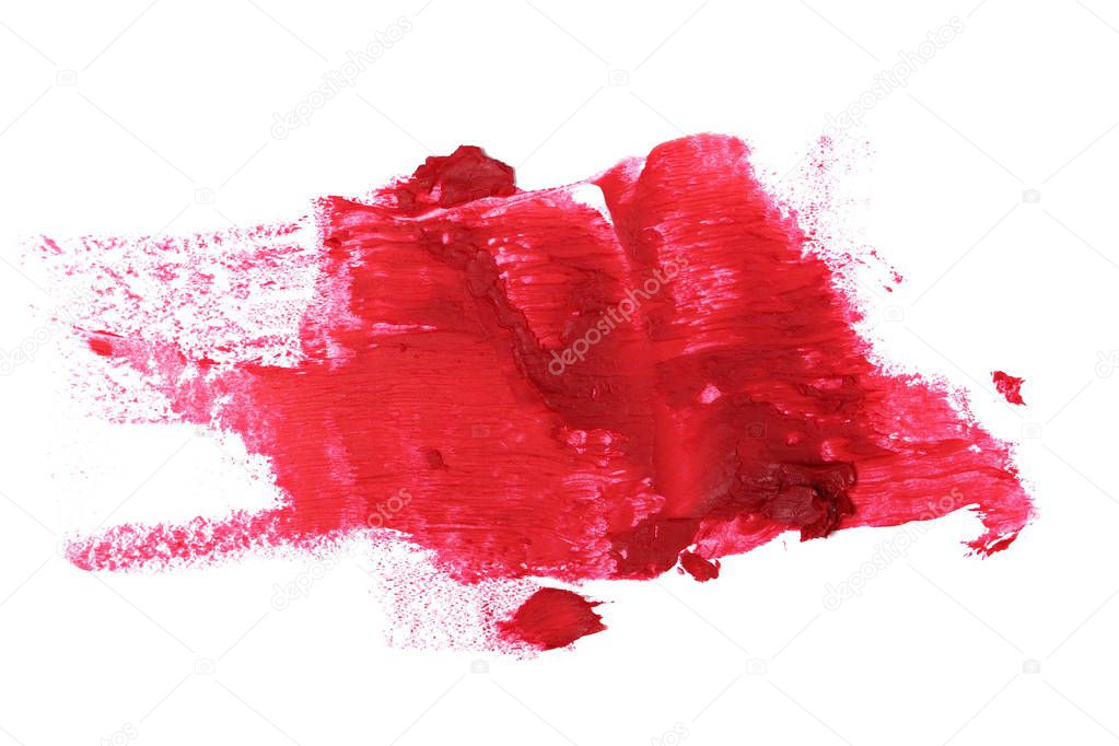 close up red color lipstick stroke on white background