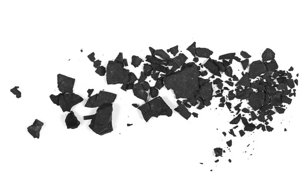 Свай черный уголь изолирован на белой текстуре, вид сверху — стоковое фото